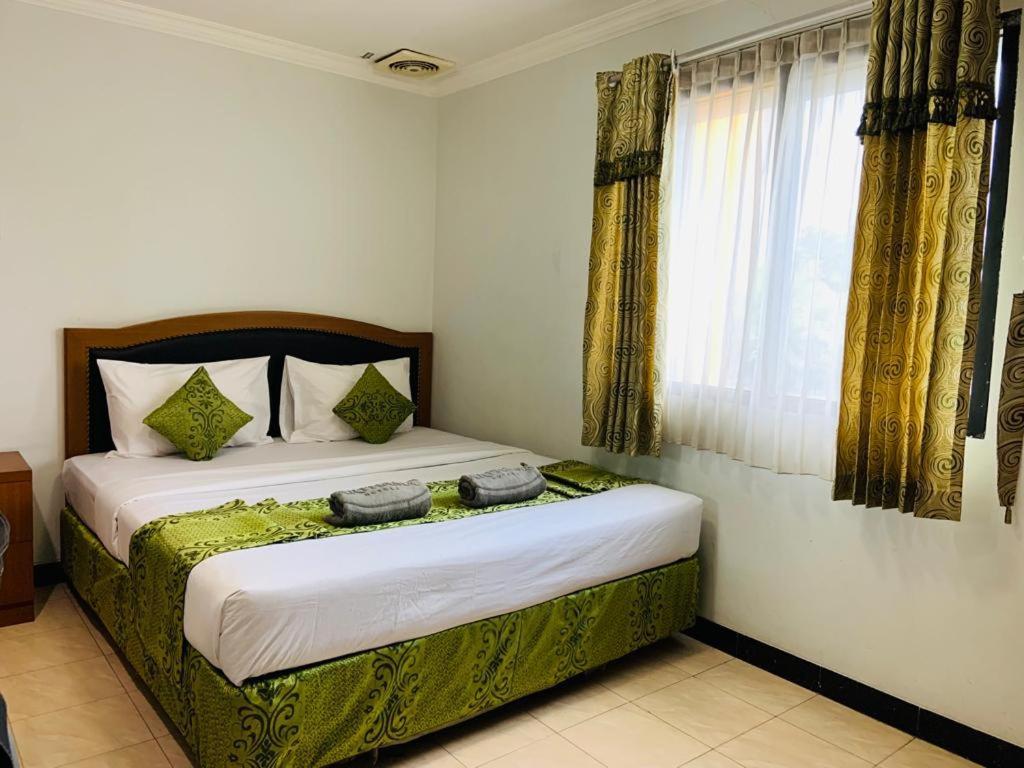 Karsa Utama Hotel Джакарта Экстерьер фото
